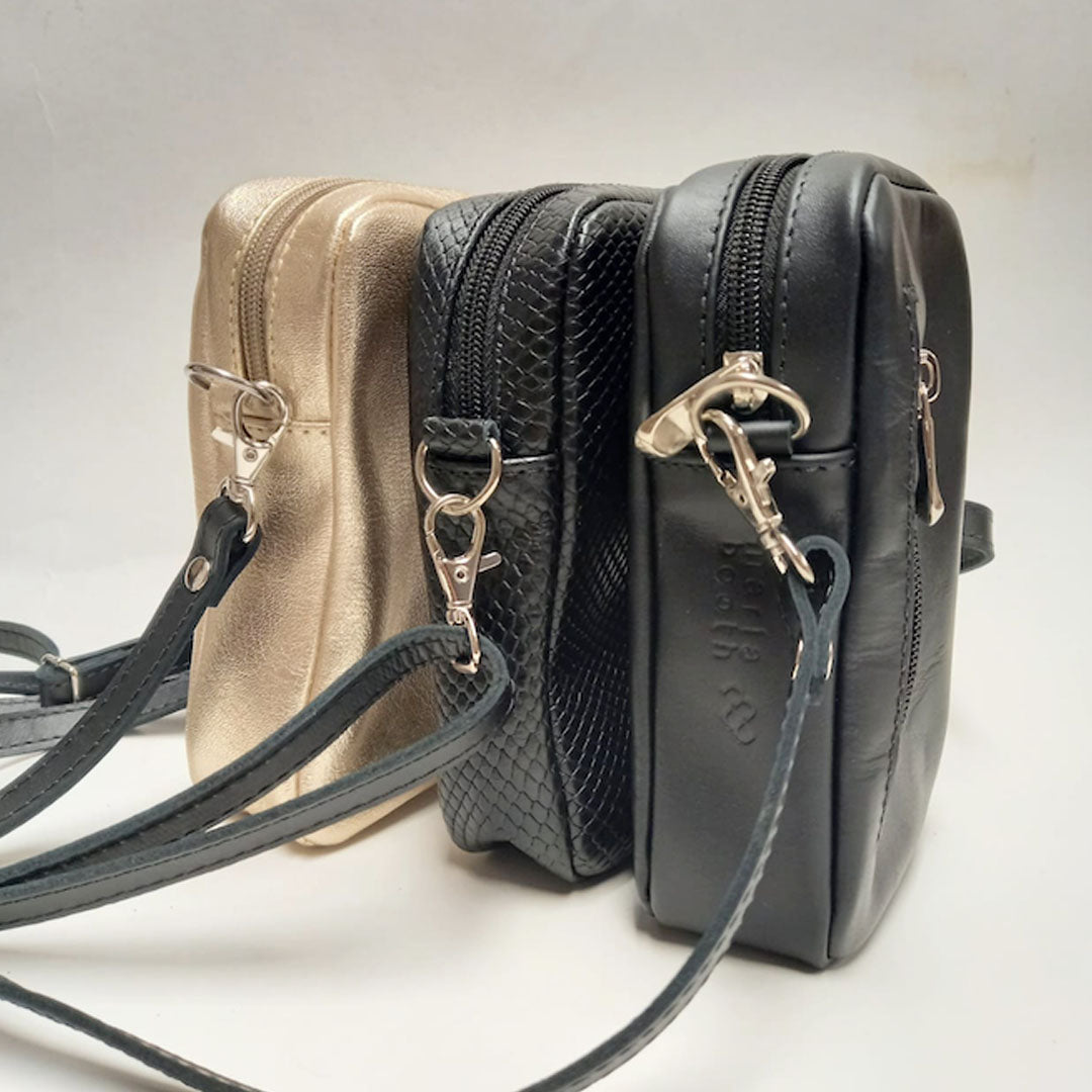 Cartera dorada porta celular