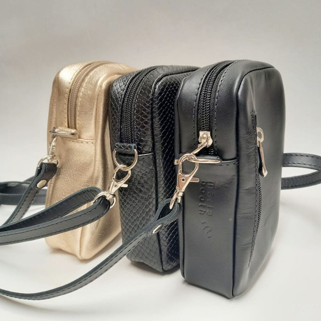 Cartera negra porta celular