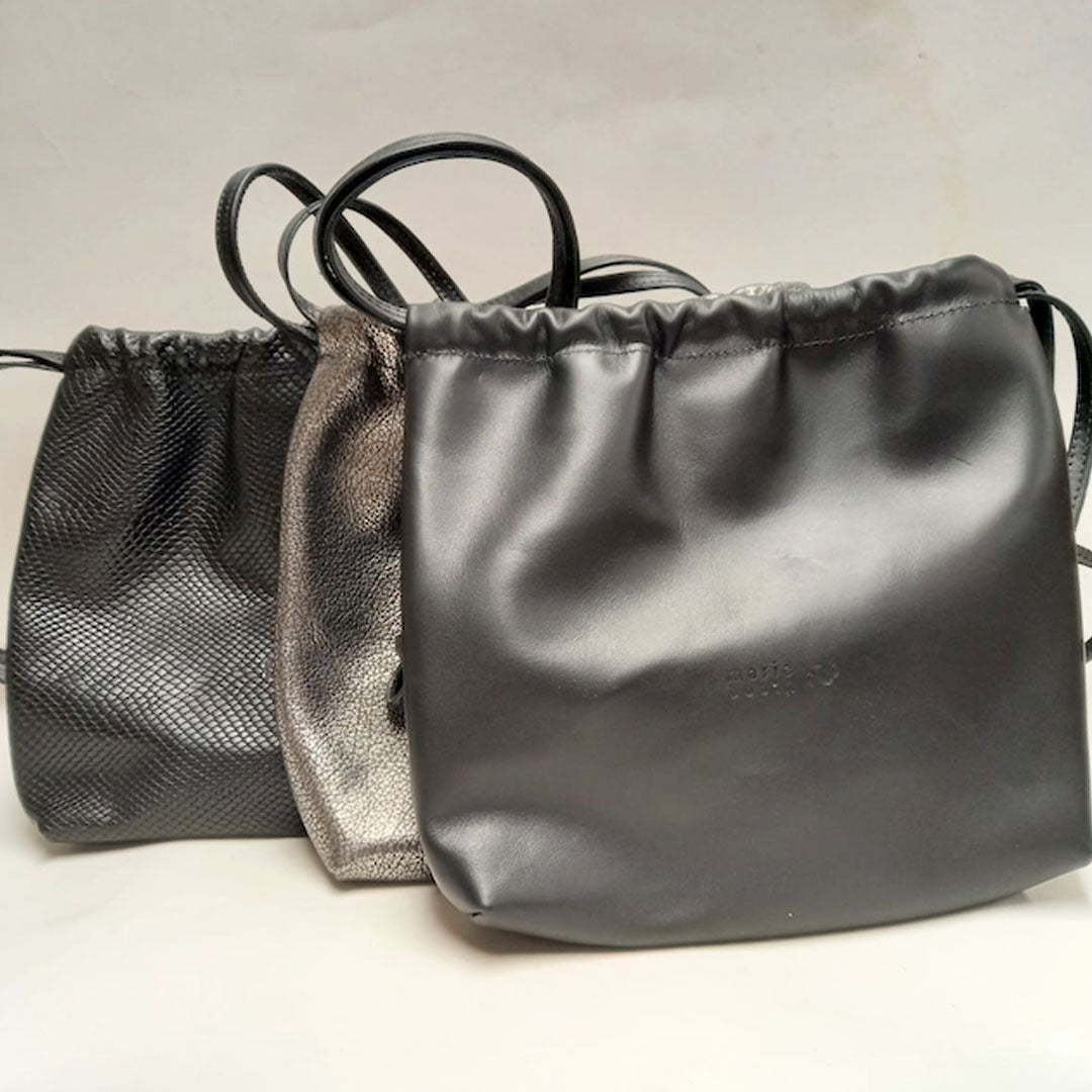 Cartera morral negro textura